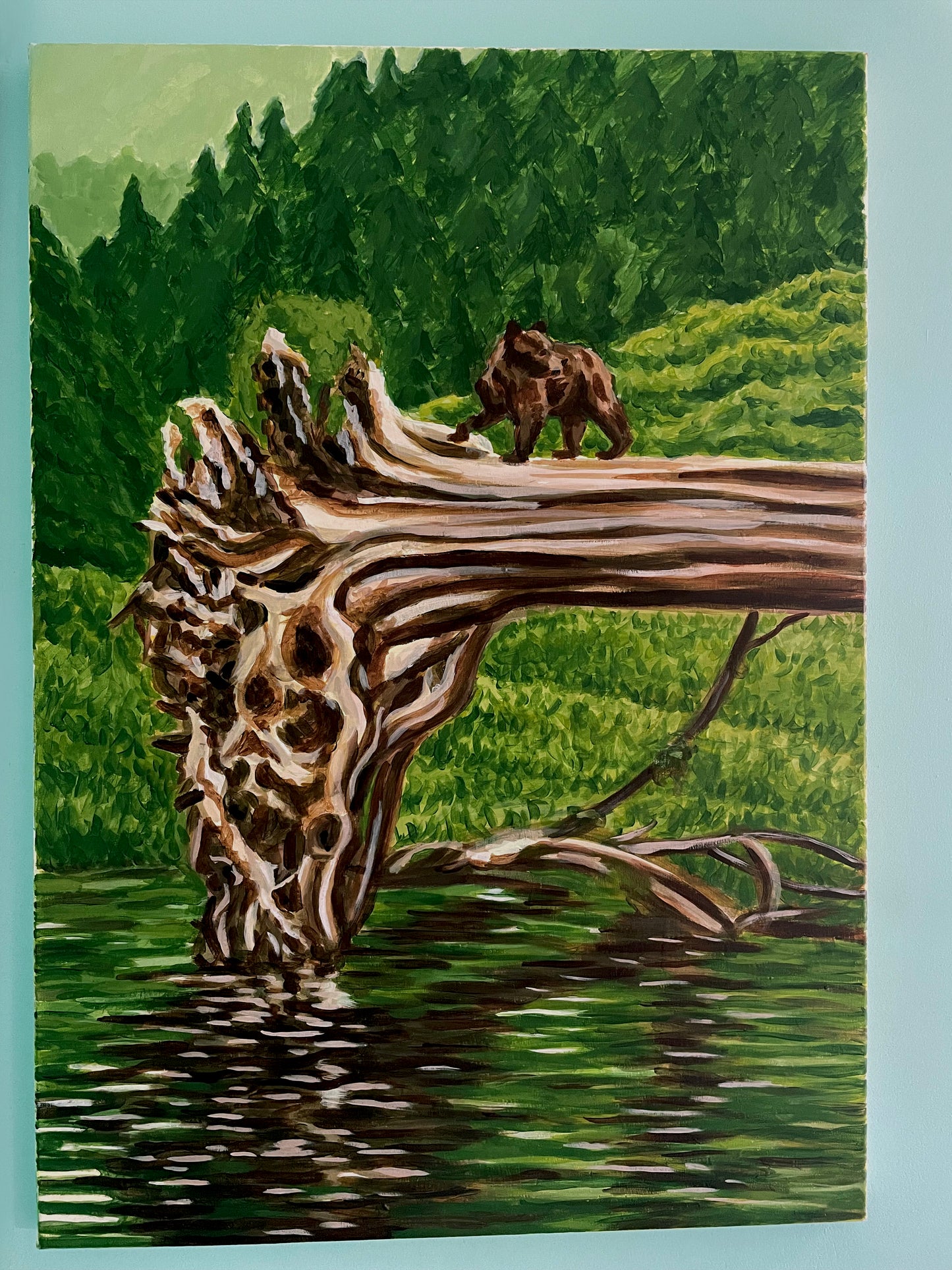 Bear on fallen tree
